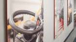 Three large acrylic office signs with industrial images and orange headers in Dayton, Ohio.