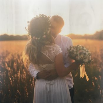 A bride and groom kissing 