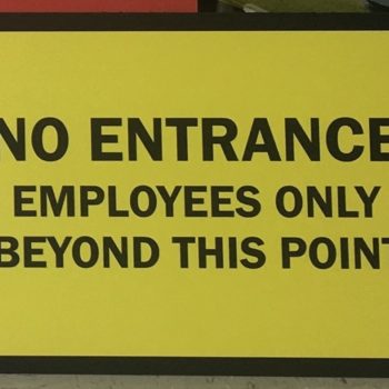 No entrance yellow sign