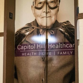 Capitol Hill Healthcare senior super hero elevator wrap
