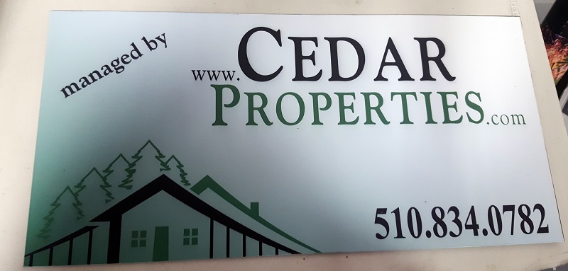 cedar properties sign