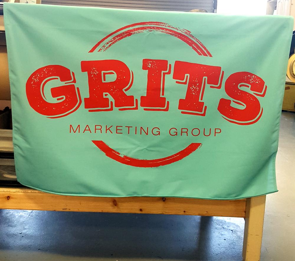GRITS Marketing Group table cover