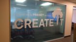 The Best Way to Predict the Future is to Create It conferenc room window graphic