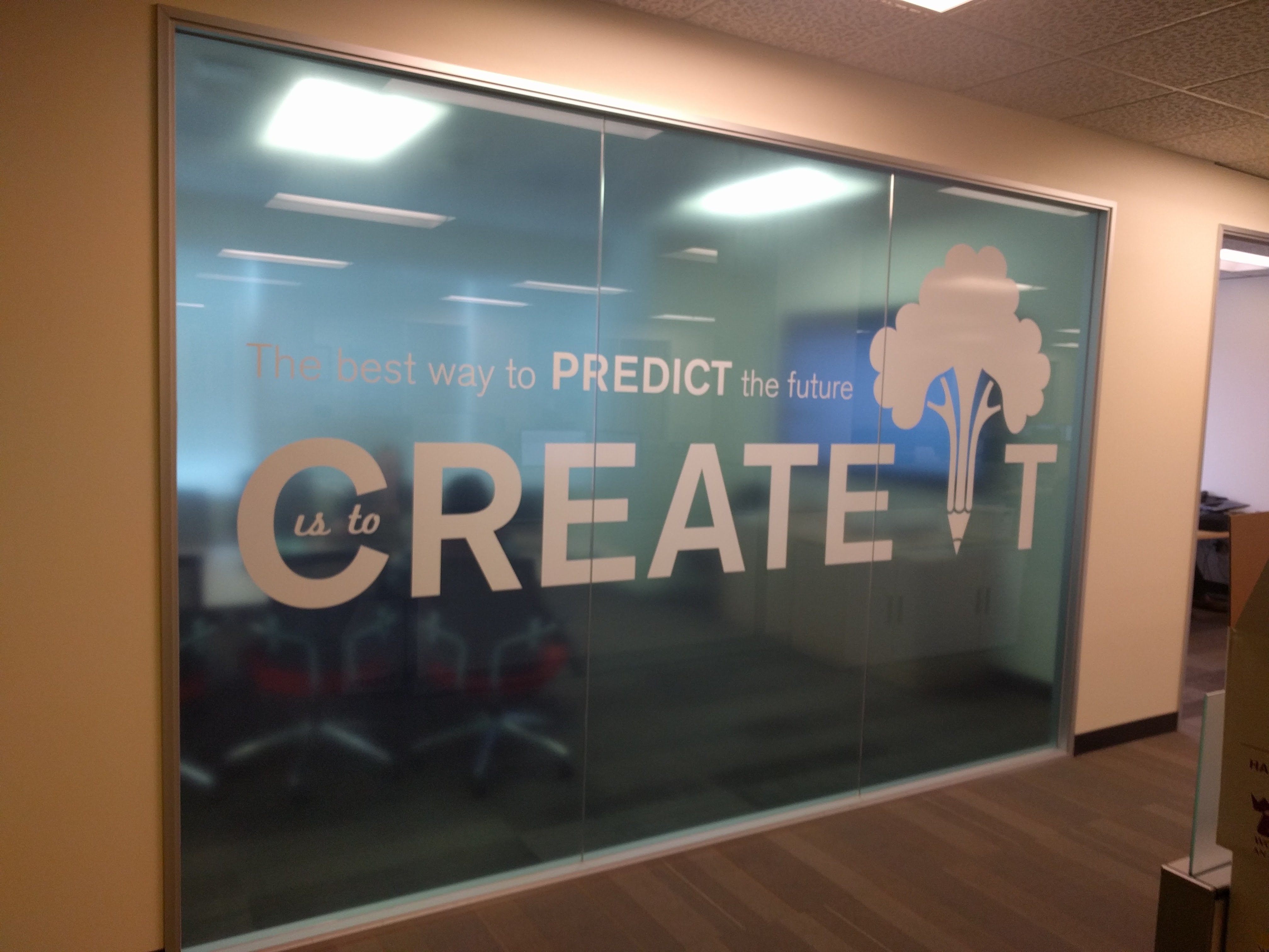 The Best Way to Predict the Future is to Create It conferenc room window graphic