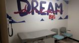 Dream Big wall mural in hospital exam room