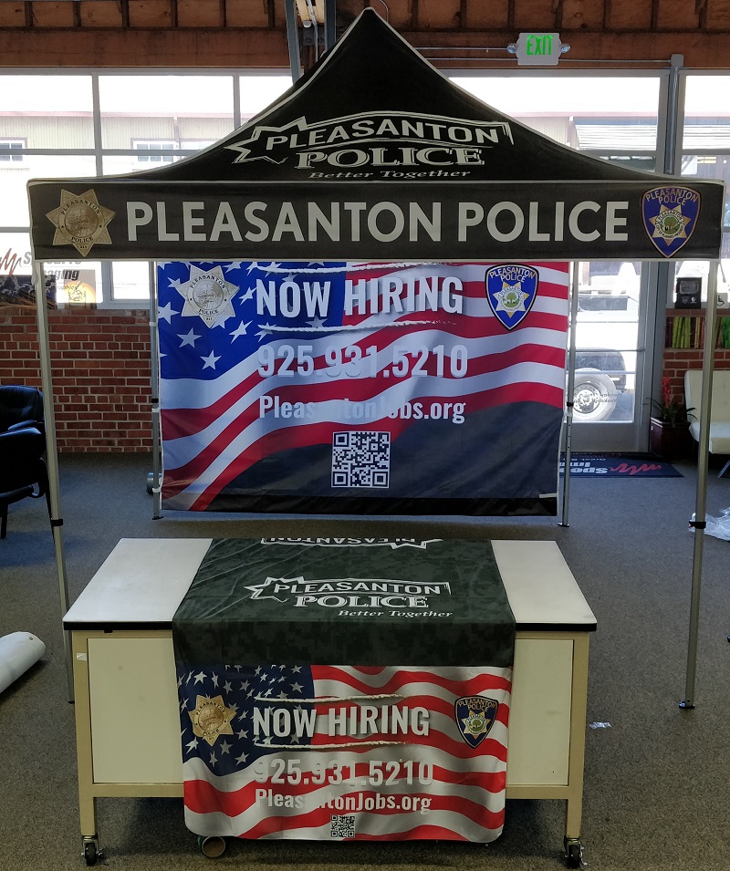 Pleasanton PD tent and table cover