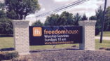 Freedom House outdoor sign