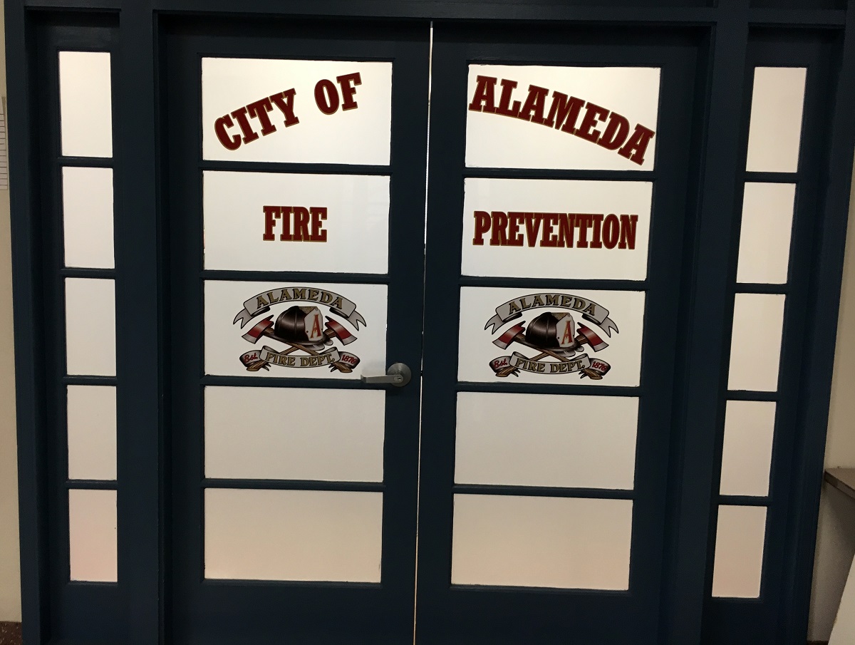 Two window graphics on glass doors for the Alameda Fire Department.