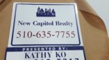 New Capitol Realty signs