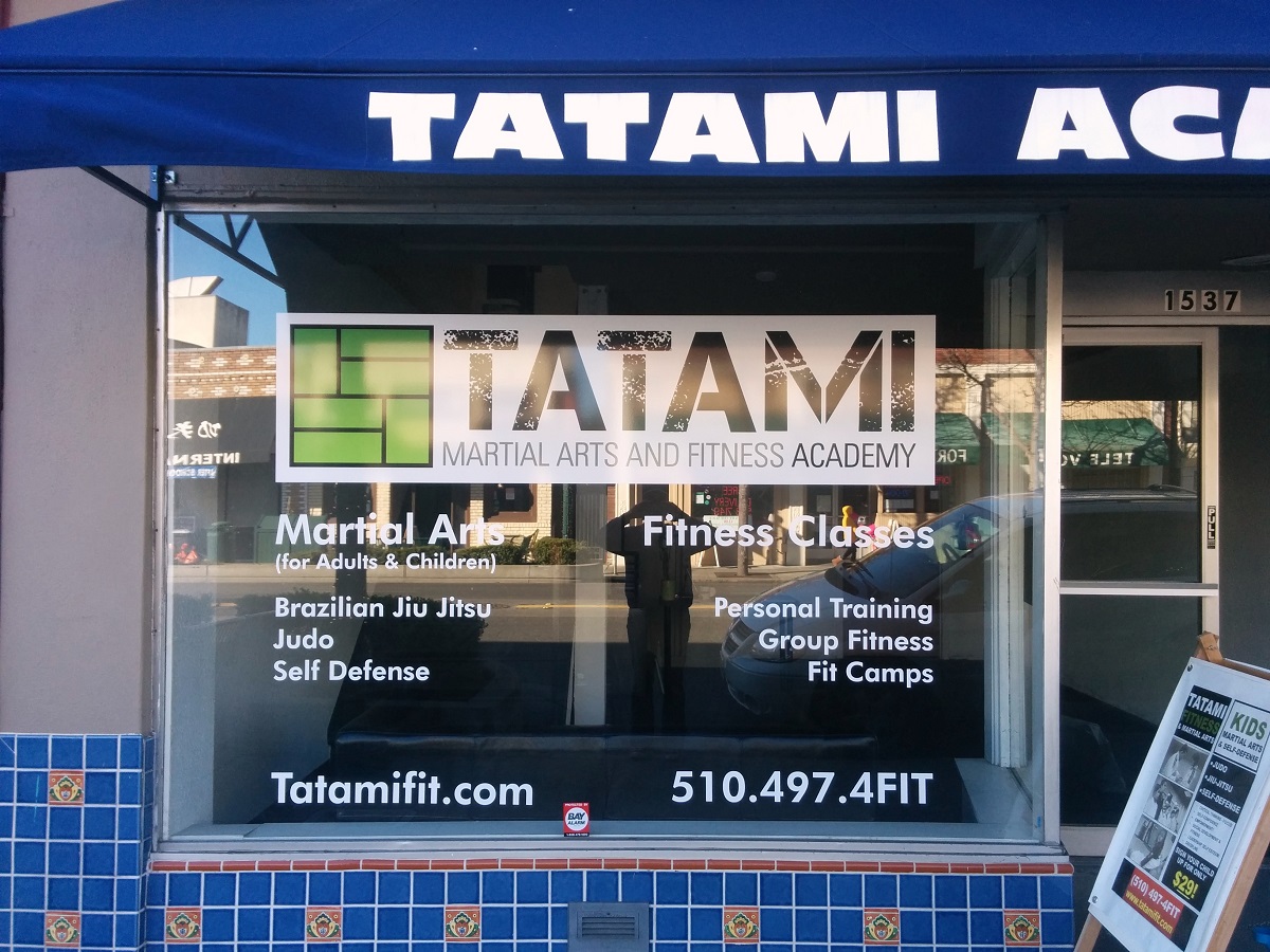 Custom window graphics for Tatami martial arts and fitness academy made by Speed Pro Imaging.