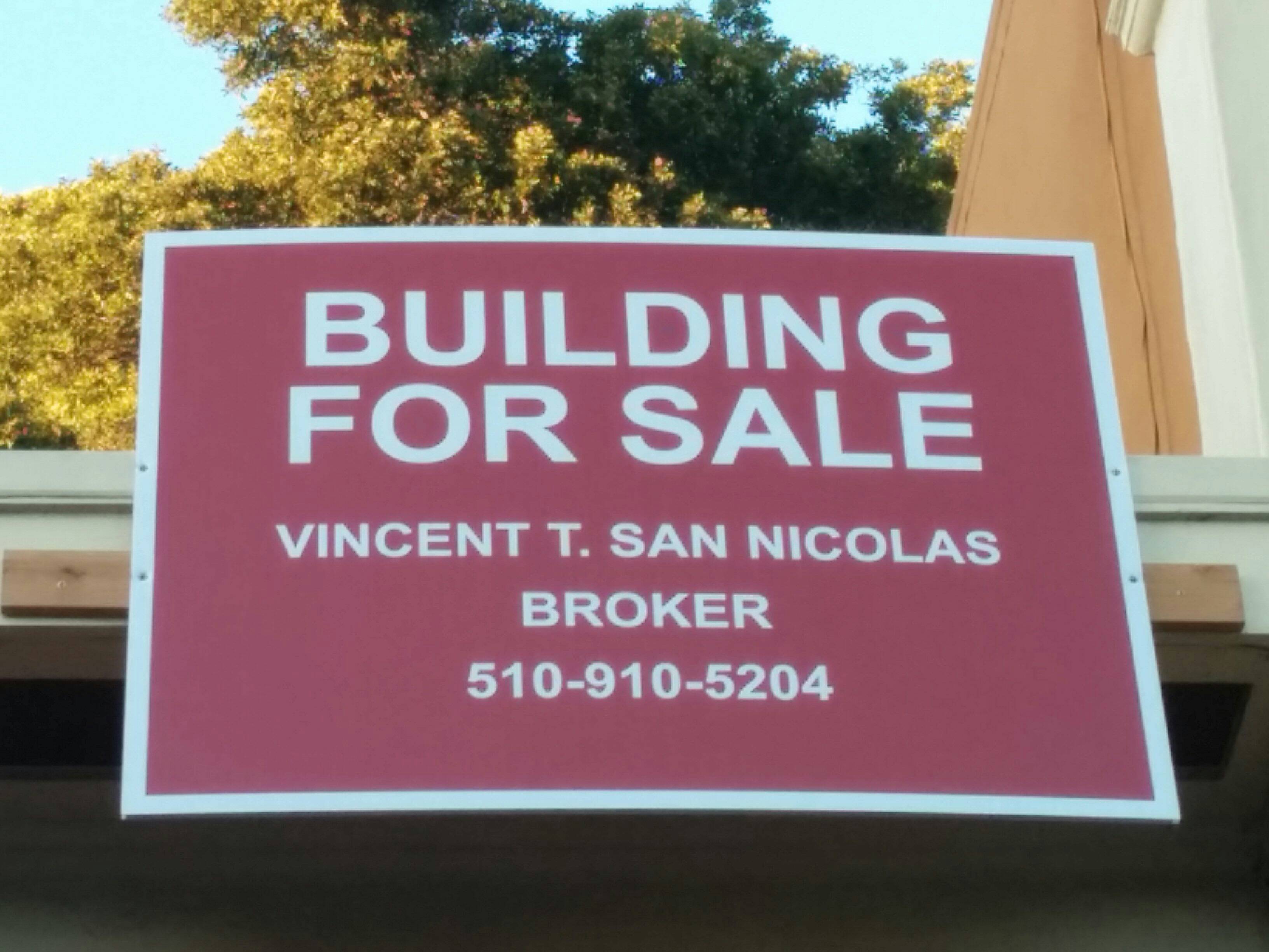 Building for Sale sign
