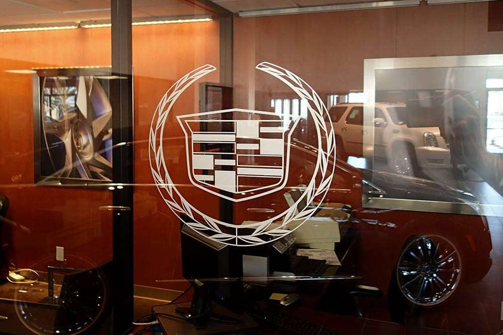 car dealership window logo