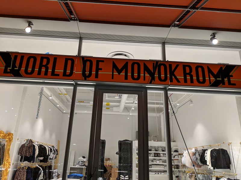 World of Monokrome sign