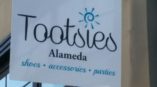 Tootsies outdoor blade sign