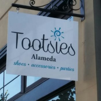 Tootsies outdoor blade sign