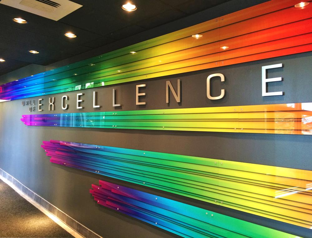 indoor rainbow signage in office