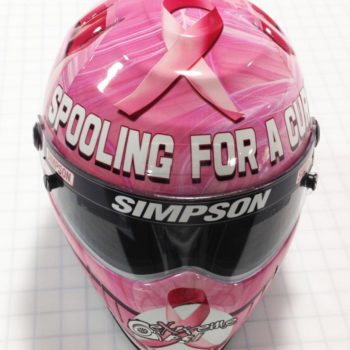 breast cancer awareness graphic on racing helmet 