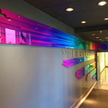 wall graphic of rainbow colors in office