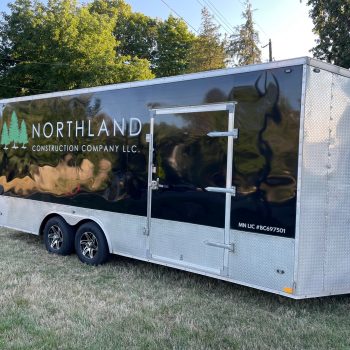 Eden Prairie, Minnesota trailer wrap featuring spot graphics on an enclosed trailer with white lettering and green logo for Northland Construction. Vehicles Graphics and Wraps. Custom vehicle wrap installation in Eden Prairie, Minneapolis, and St. Paul by SpeedPro Imaging Fleet vehicle graphics in Bloomington, Edina, and St. Louis Park for branded company vehicles Commercial vehicle wraps in Hopkins, Minnetonka, and Excelsior for mobile advertising Vehicle graphics near me in Richfield, Golden Valley, and Maple Grove for business branding Full vehicle wraps in Rogers, Shakopee, and Chaska for high-impact advertising on the road Twin Cities fleet graphics and wraps in Chanhassen, Eden Prairie, and Prior Lake Custom van wraps in Savage, Burnsville, and Bloomington for local service businesses Truck graphics and vehicle decals in Minneapolis, St. Paul, and Maple Grove Partial vehicle wraps in Edina, St. Louis Park, and Hopkins for cost-effective branding High-impact vehicle wraps in Minnetonka, Excelsior, and Chanhassen for business promotion Fleet branding and vehicle graphics in Golden Valley, Richfield, and Savage Custom car wraps in Prior Lake, Shakopee, and Chaska for business and promotional use Twin Cities vehicle wrap services in Rogers, Maple Grove, and Burnsville Vehicle wraps near me in Eden Prairie, Minneapolis, and surrounding suburbs Commercial fleet graphics in St. Paul, Bloomington, and Edina for consistent brand visibility