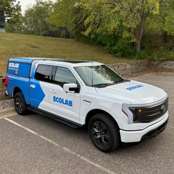 Eden Prairie, Minnesota vehicle wrap featuring a partial wrap on a white truck with blue graphics and logo for Ecolab. Vehicles Graphics and Wraps. Custom vehicle wrap installation in Eden Prairie, Minneapolis, and St. Paul by SpeedPro Imaging Fleet vehicle graphics in Bloomington, Edina, and St. Louis Park for branded company vehicles Commercial vehicle wraps in Hopkins, Minnetonka, and Excelsior for mobile advertising Vehicle graphics near me in Richfield, Golden Valley, and Maple Grove for business branding Full vehicle wraps in Rogers, Shakopee, and Chaska for high-impact advertising on the road Twin Cities fleet graphics and wraps in Chanhassen, Eden Prairie, and Prior Lake Custom van wraps in Savage, Burnsville, and Bloomington for local service businesses Truck graphics and vehicle decals in Minneapolis, St. Paul, and Maple Grove Partial vehicle wraps in Edina, St. Louis Park, and Hopkins for cost-effective branding High-impact vehicle wraps in Minnetonka, Excelsior, and Chanhassen for business promotion Fleet branding and vehicle graphics in Golden Valley, Richfield, and Savage Custom car wraps in Prior Lake, Shakopee, and Chaska for business and promotional use Twin Cities vehicle wrap services in Rogers, Maple Grove, and Burnsville Vehicle wraps near me in Eden Prairie, Minneapolis, and surrounding suburbs Commercial fleet graphics in St. Paul, Bloomington, and Edina for consistent brand visibility