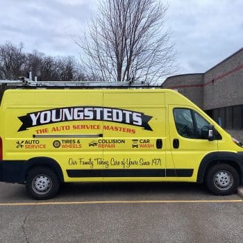 Eden Prairie, Minnesota vehicle wrap featuring a fully wrapped yellow sprinter van with graphics of logo and services for Youngstedts