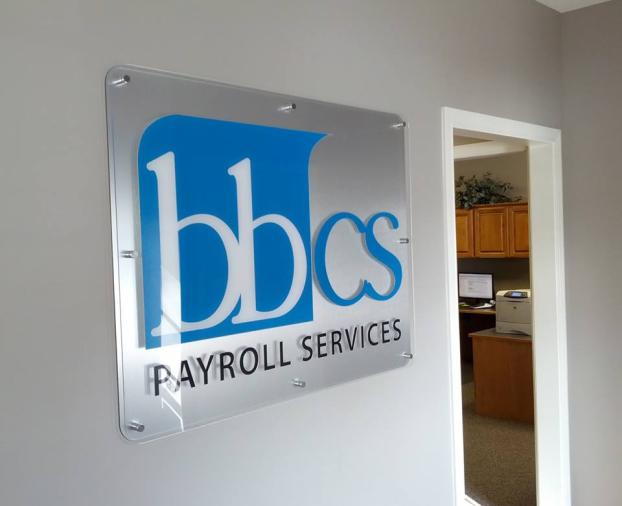 BBCS payroll services wall plaque