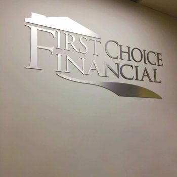 First Choice Financial logo on a wall