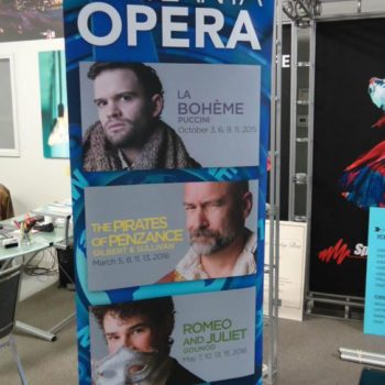 The Atlanta Opera standing banner with event & dates 