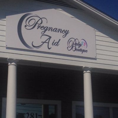 Pregnancy Aid wall sign 