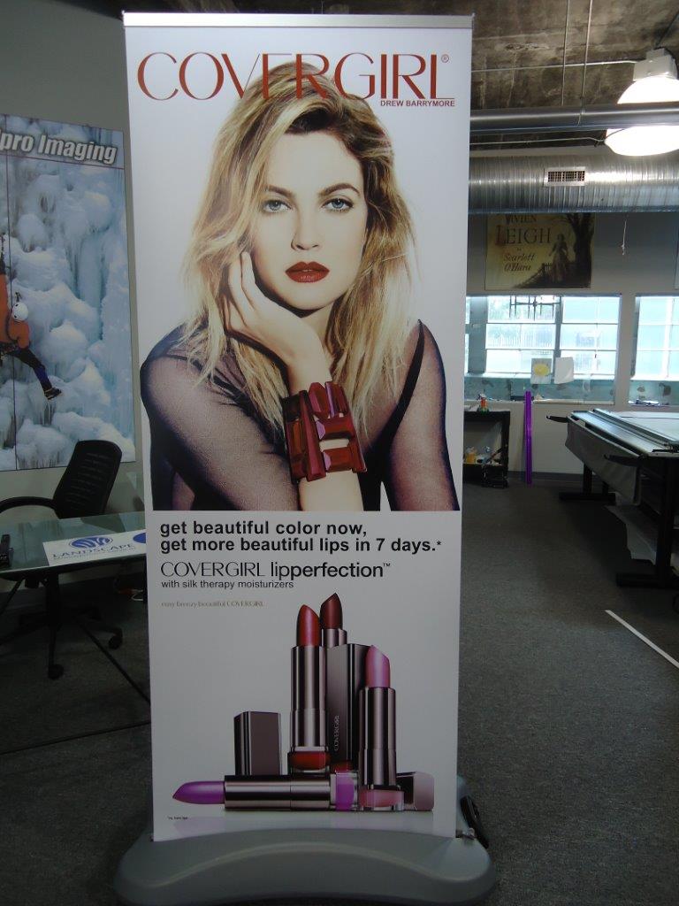 Covergirl Drew Barrymore standing sign 