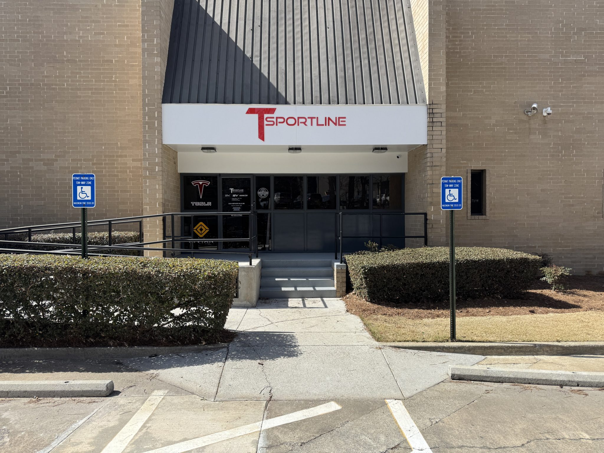 red logo on exterior of warehouse