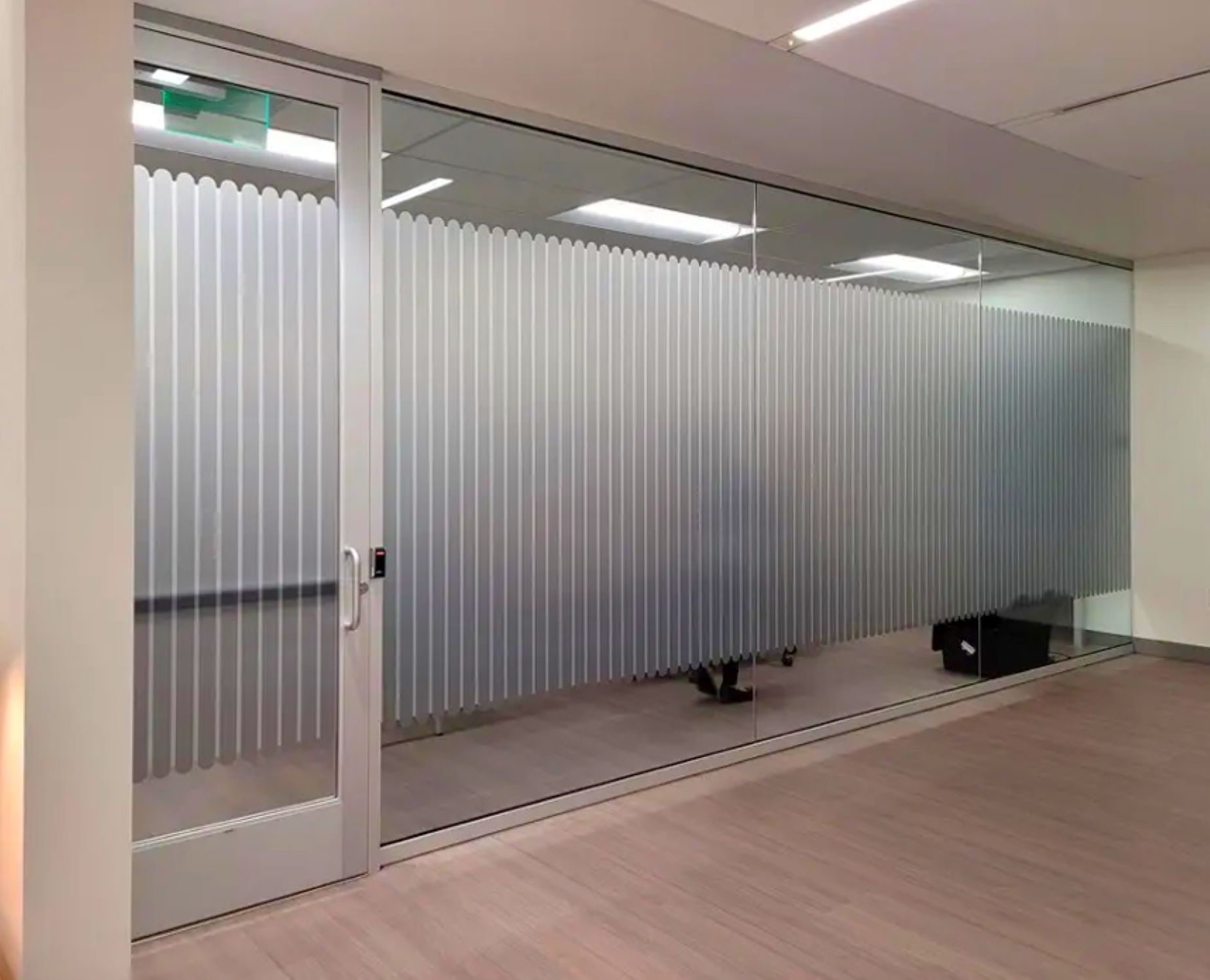 Printed etch vinyl printed and installed on glass