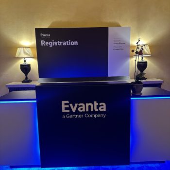 Illuminated lobby registration desk sign with acrylic panels and LED lighting in San Diego, CA.