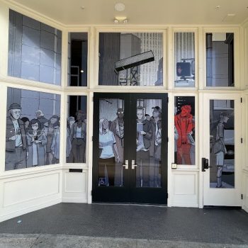 Window graphics with illustrated people on glass doors and surrounding windows in San Diego, CA.