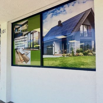 Window graphics with home improvement images and text on a commercial building in San Diego, CA.