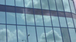 Reflective window film on commerical building