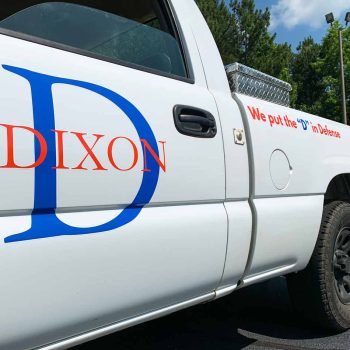 Side logo decals on a Dixon Pest fleet van in Greenville, SC
