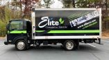 Full box truck wrap showcasing Elite CSI's green and black colors as well as company information.