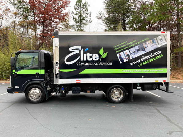 Full box truck wrap showcasing Elite CSI's green and black colors as well as company information.