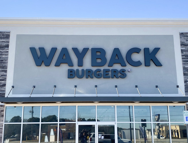 Wayback Burgers storefront sign in black.