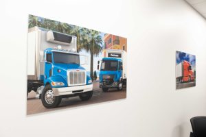 Ultraboard prints showcasing company's truck models.