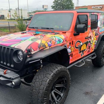 Custom grafitti themed jeep wrap.