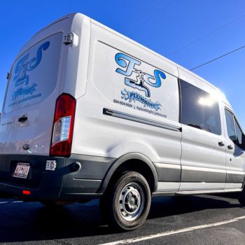 Van logo graphics for a plumbing company.