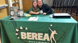 Regular table throw printed green with volleyballs and the Berea Bulldogs Volleyball logo