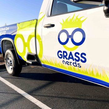 Branded partial wrap with Grass Nerds logo, contact info and brand colors