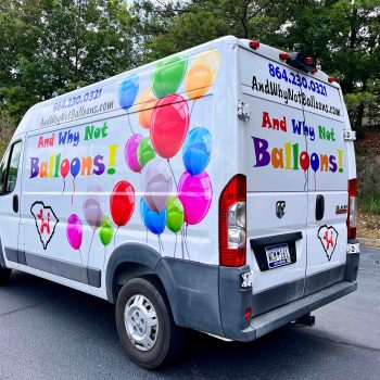 White company van with colorful vinyl logo and baloon clusters for And Why Not Balloons