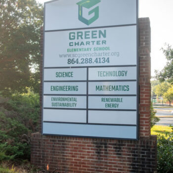 Translucent vinyl on a backlit monument sign featuring school information and programs at Green Charter Elementary School in Greenville, SC