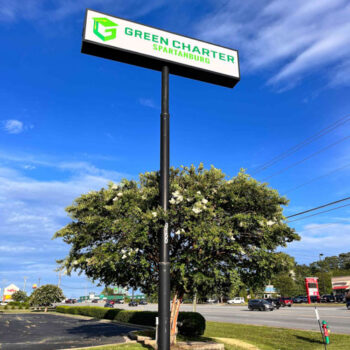 Roadside sign with updated logo graphics for Green Charter School of Spartanburg, SC