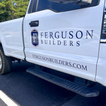 Custom cut logo decals on a Ferguson Builders fleet truck in Greenville, SC