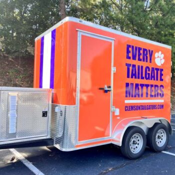 The side view of a helmet themed tailgating trailer wrap for Clemson Tailgaters